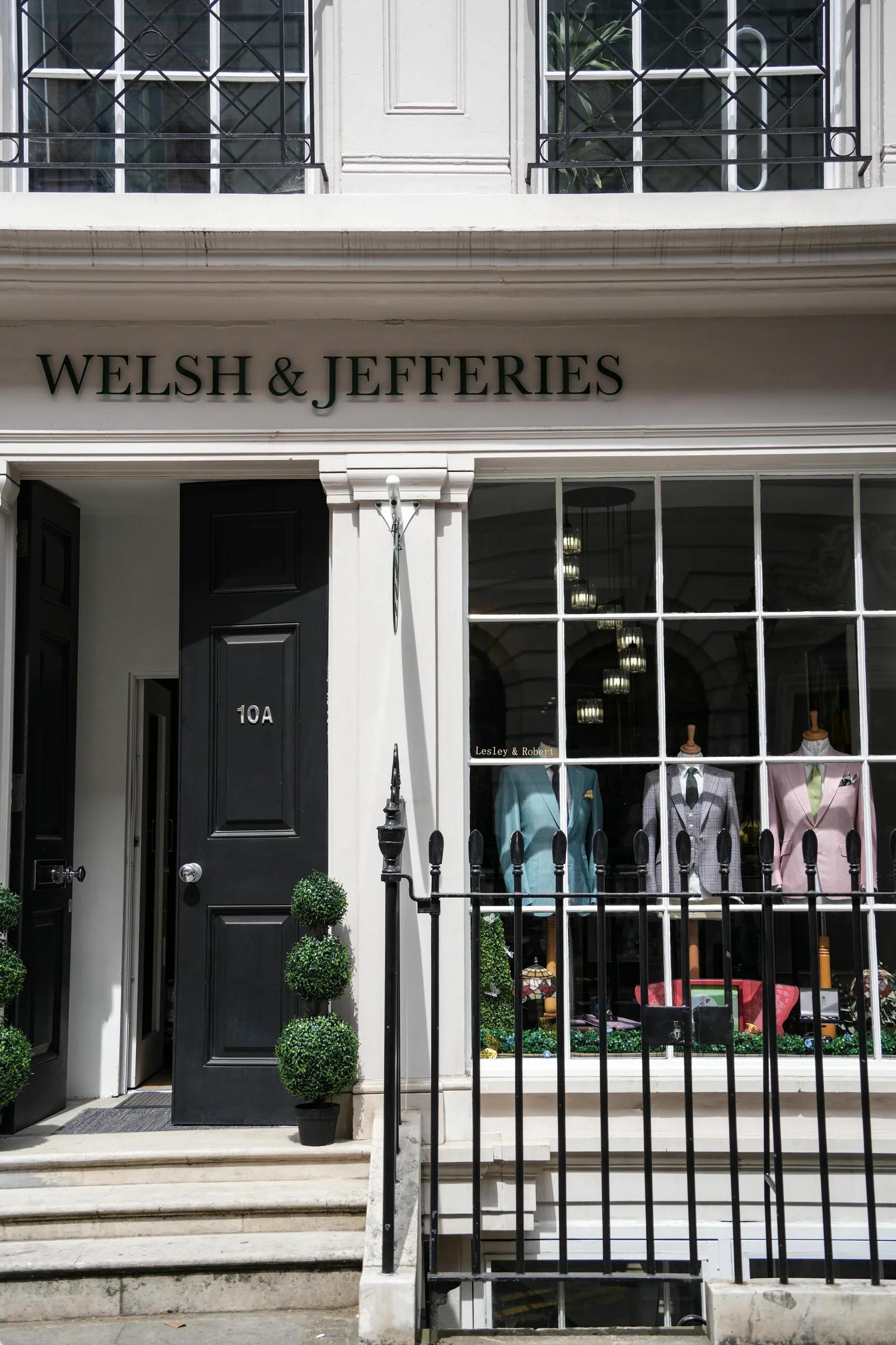 The full Welsh & Jefferies facade, entrance steps and tailoring window.