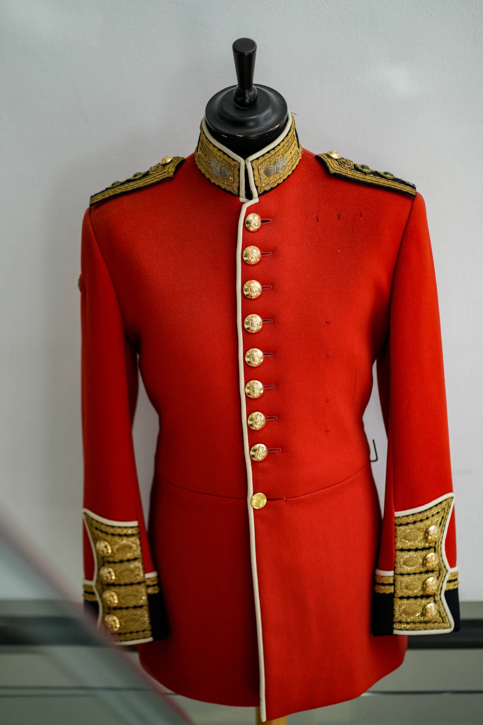 Front view of a scarlet Welsh & Jefferies ceremonial tunic