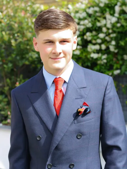 Claret windowpane double-breasted, cut for a graduation ball